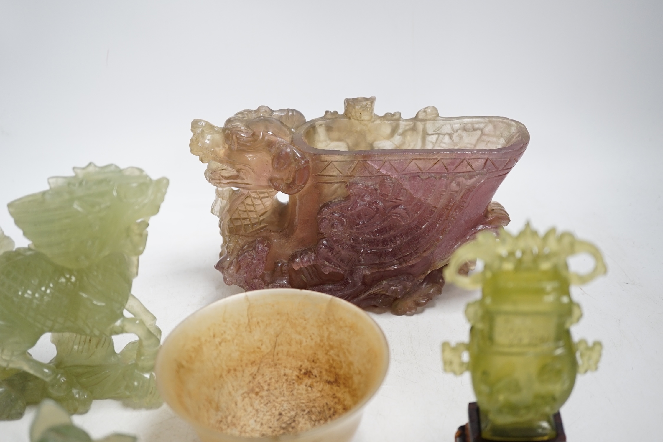 A group of seven Chinese hardstone carvings and vessels, tallest 12cm. Condition - poor to fair